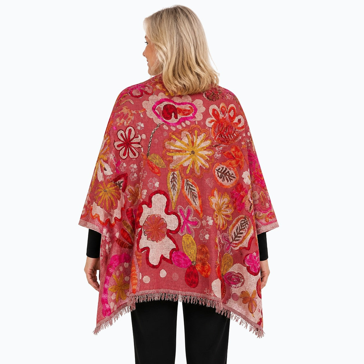 Woman wearing the Claire Powell Coral Wool Shawl, back view