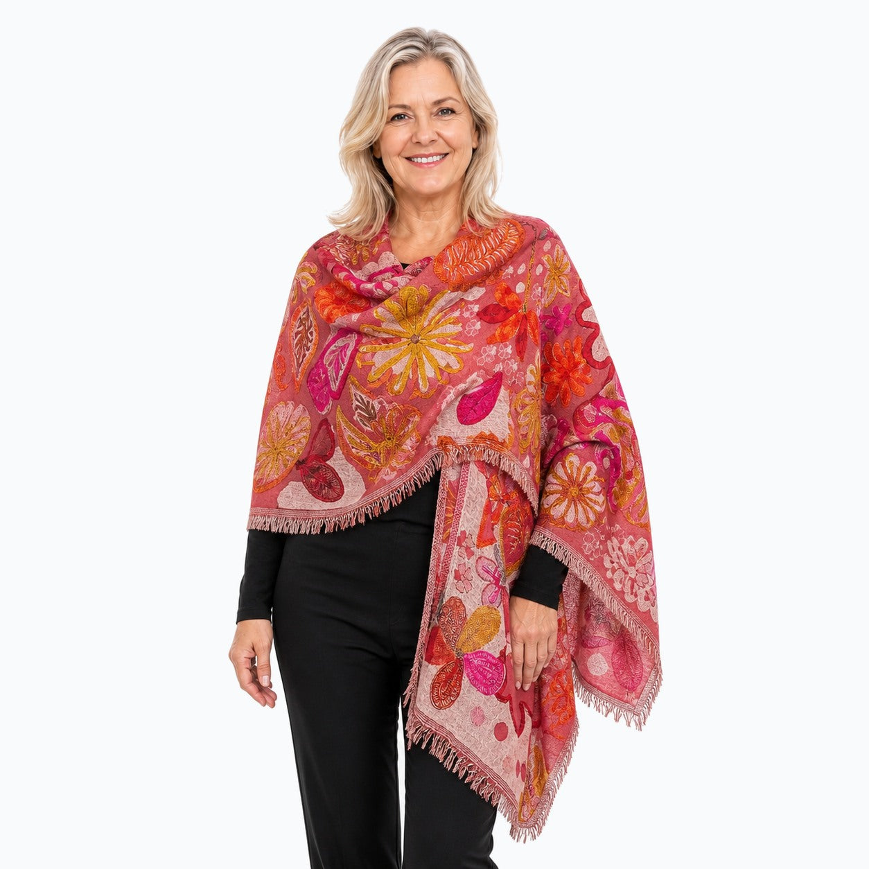 Woman wearing the Claire Powell Coral Wool Shawl, three-quarter view