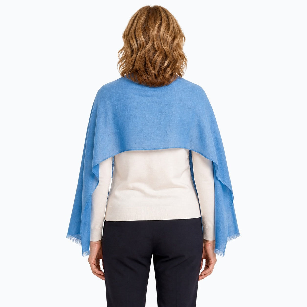 Woman wearing the Claire Powell Denim Blue Silk Wool Scarf, back view
