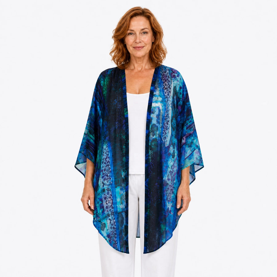 Woman wearing the Claire Powell Dream Modal Kimono Cover-Up, front view