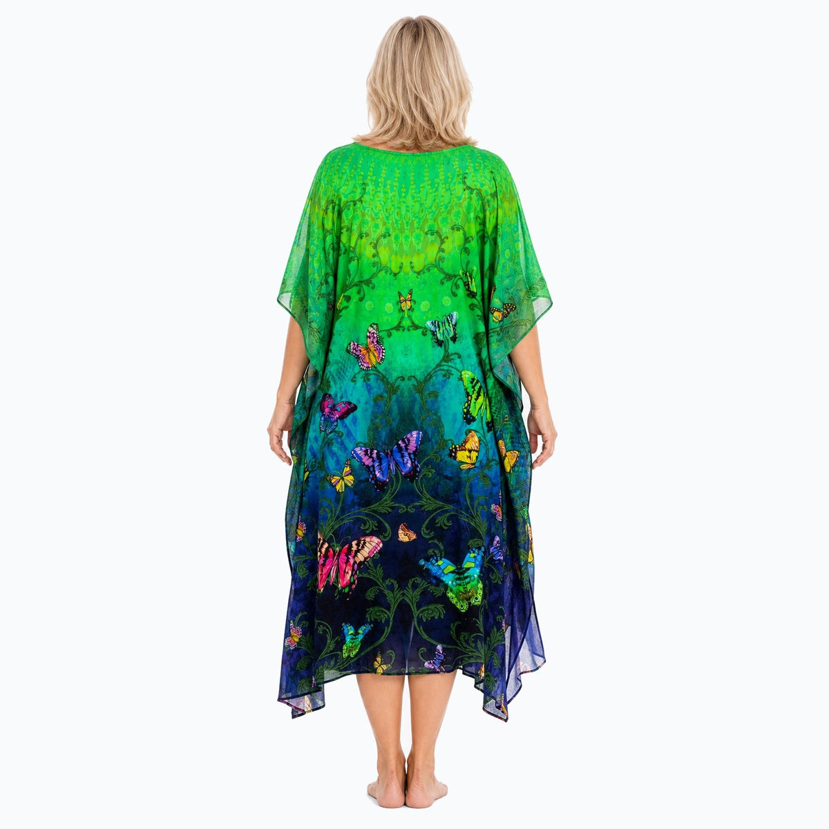 Claire Powell Flutter midi kaftan dress on a mature woman, back view