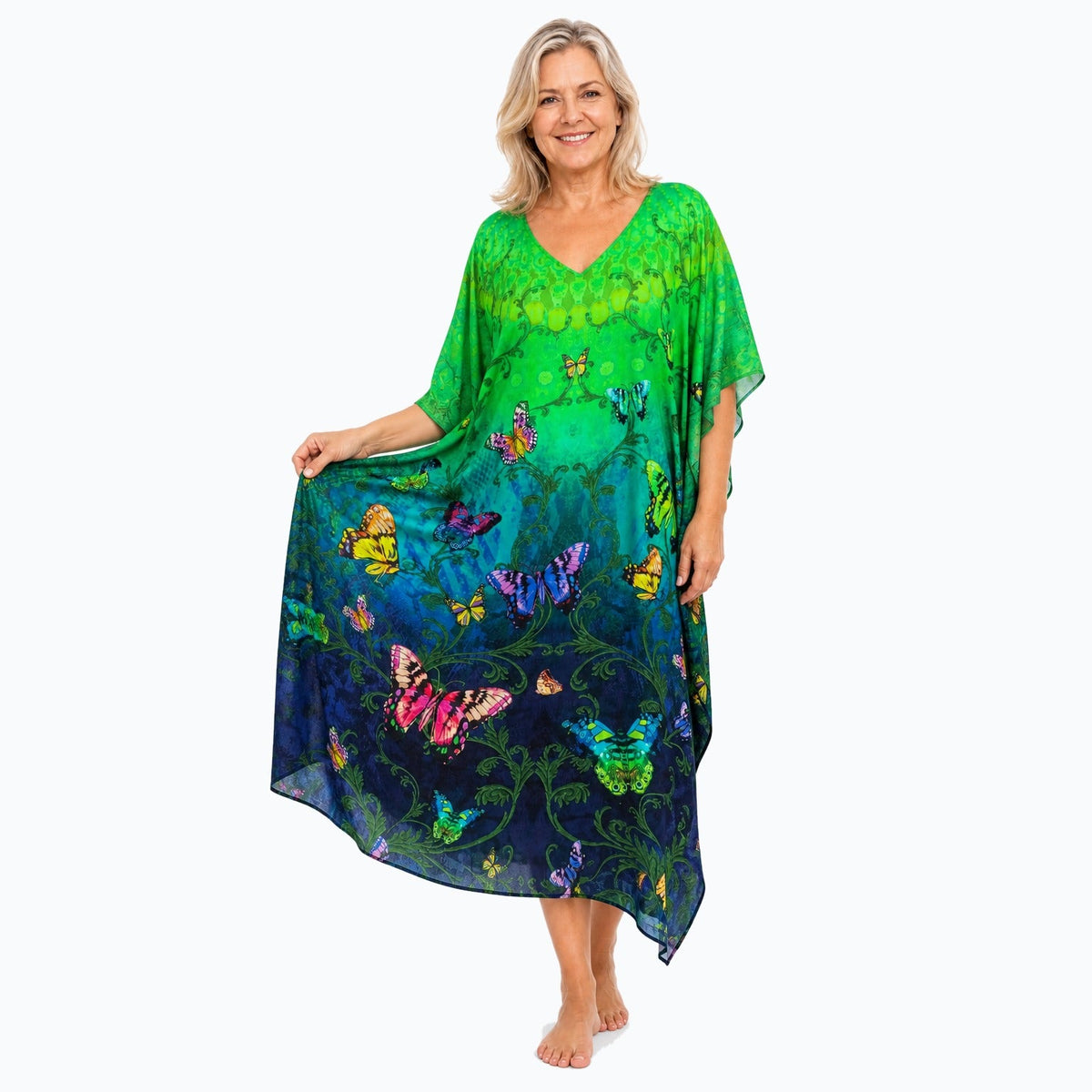 Claire Powell Flutter midi kaftan dress on a mature woman, fabric-showing pose