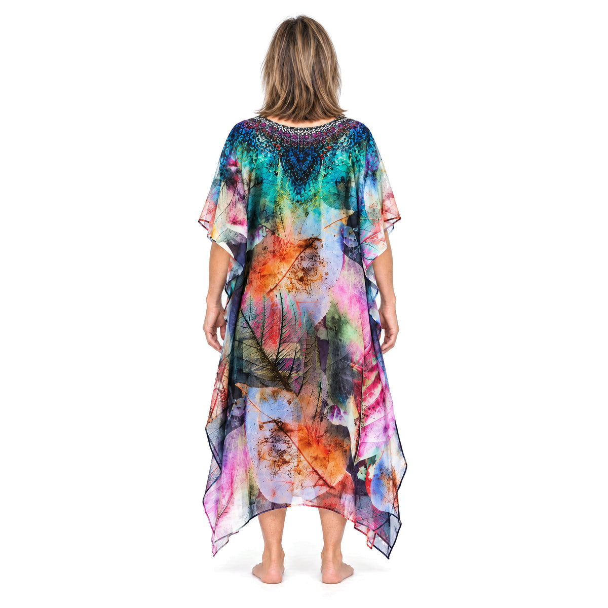 Claire Powell Heaven midi kaftan dress on a mature woman, back view