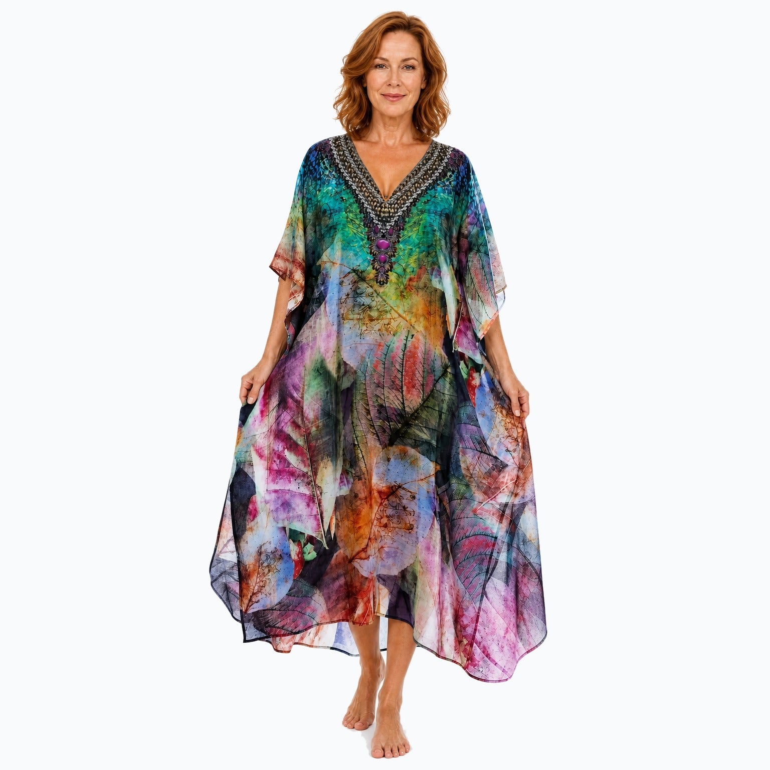 Claire Powell Heaven midi kaftan dress on a mature woman, fabric-showing pose