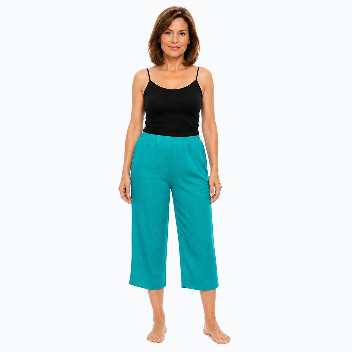 Woman wearing the Claire Powell Jade Viscose 7/8 Pants, front view