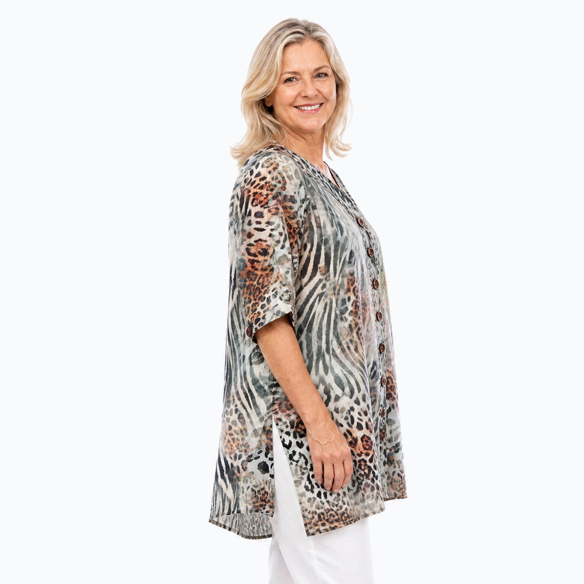Woman wearing the Claire Powell Jungle A-Line Tunic Shirt, side view
