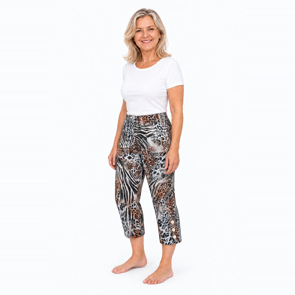 Woman wearing Claire Powell Jungle capri pants, three-quarter view