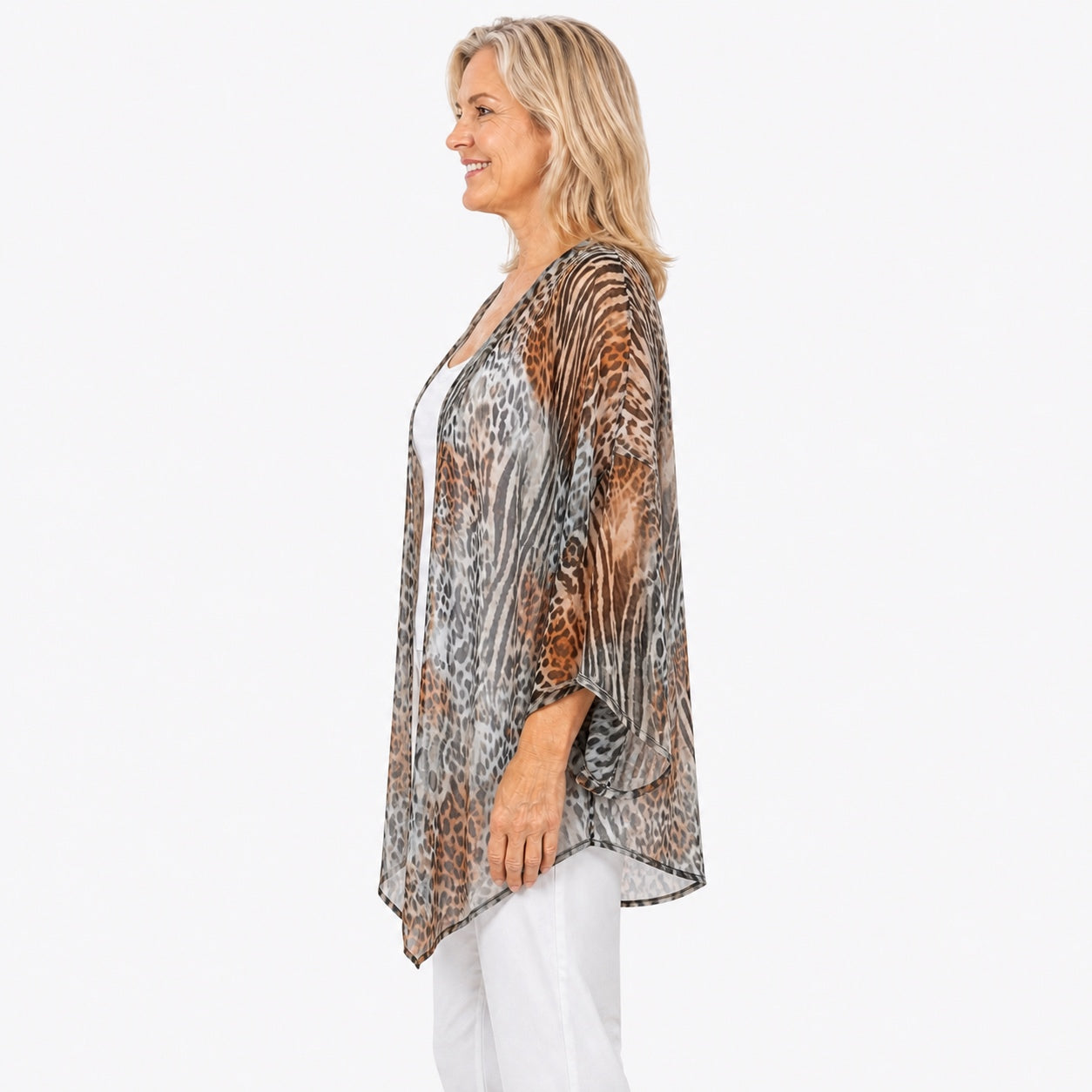 Woman wearing the Claire Powell Jungle Cotton Chiffon Kimono Cover-Up, side view
