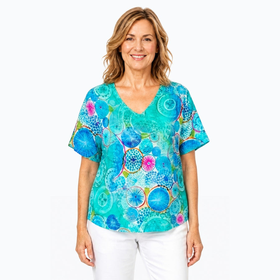 Woman wearing the Claire Powell Kaleido V-Neck T-Shirt, front view