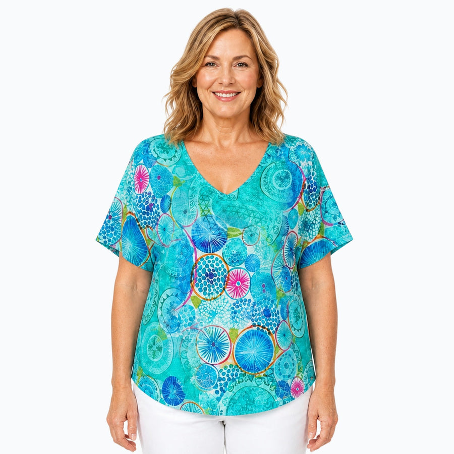 Woman wearing the Claire Powell Kaleido V-Neck T-Shirt, front view