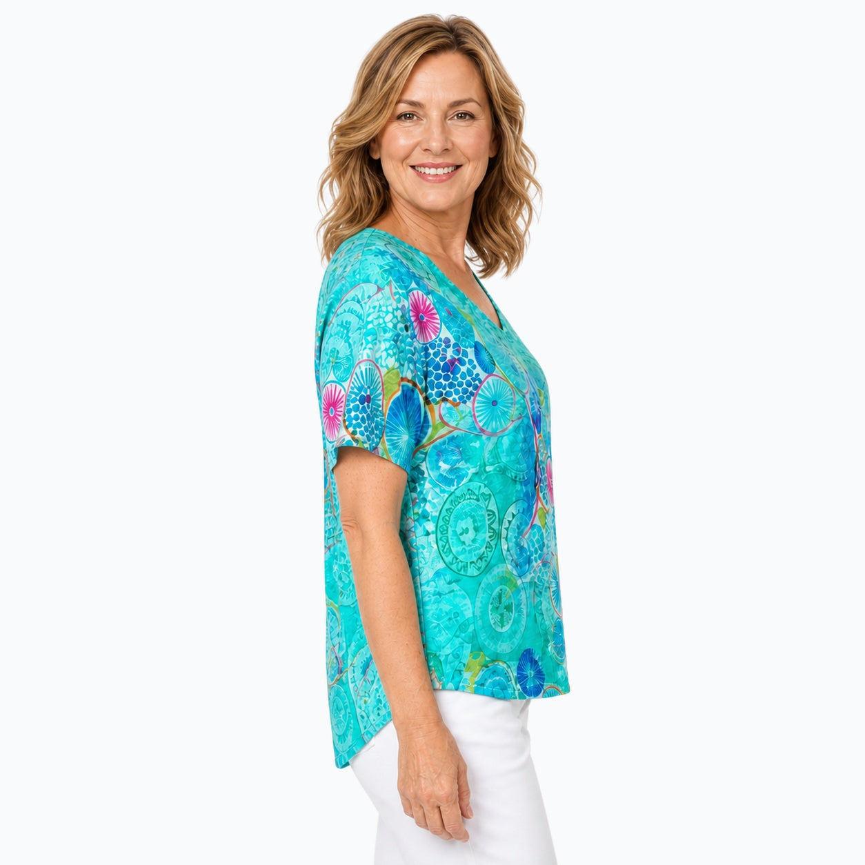 Woman wearing the Claire Powell Kaleido V-Neck T-Shirt, side view