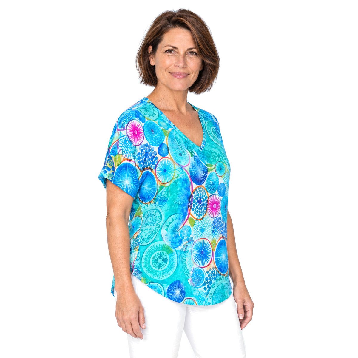 Woman wearing the Claire Powell Kaleido V-Neck T-Shirt, three-quarter view