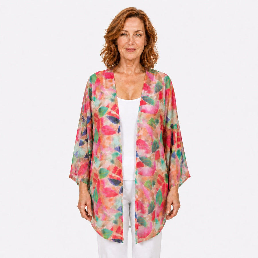 Woman wearing the Claire Powell La Peach Cotton Chiffon Kimono Cover-Up, front view