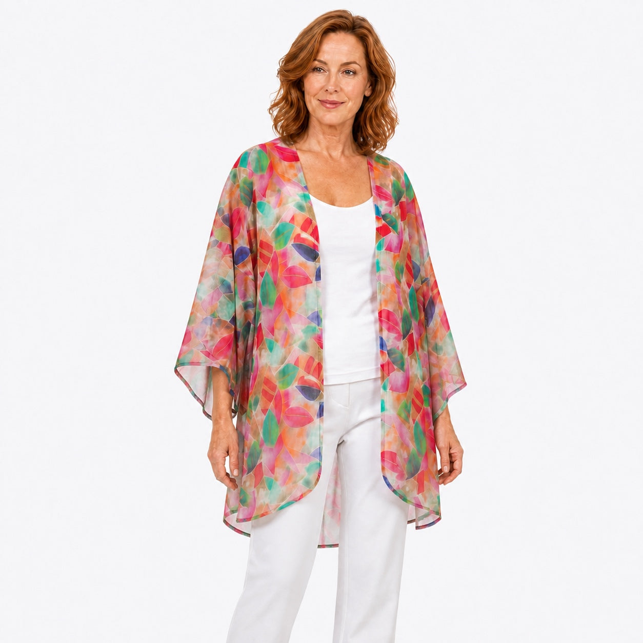 Woman wearing the Claire Powell La Peach Cotton Chiffon Kimono Cover-Up, three-quarter view
