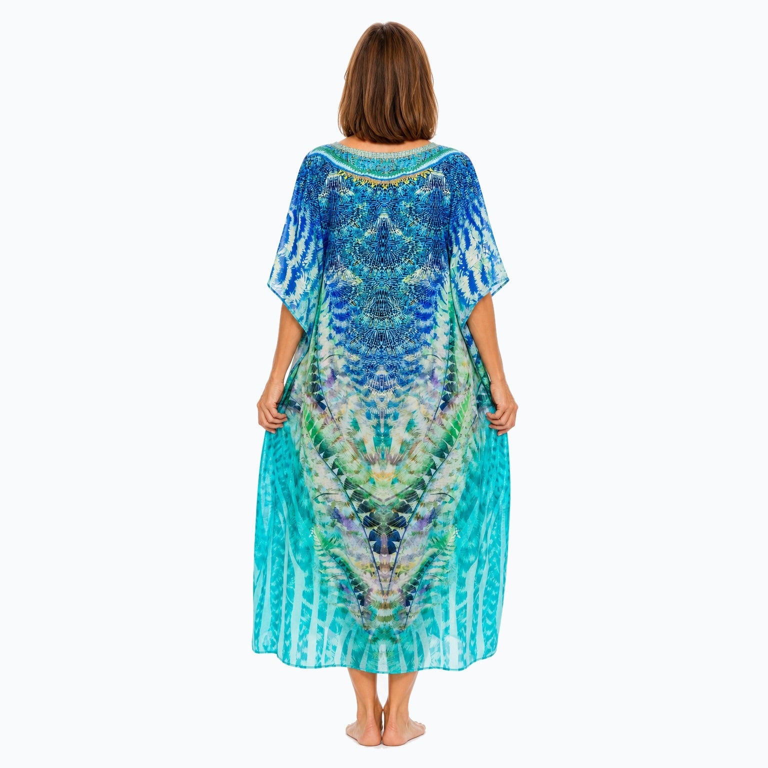 Claire Powell Marine midi kaftan dress on a mature woman, back view
