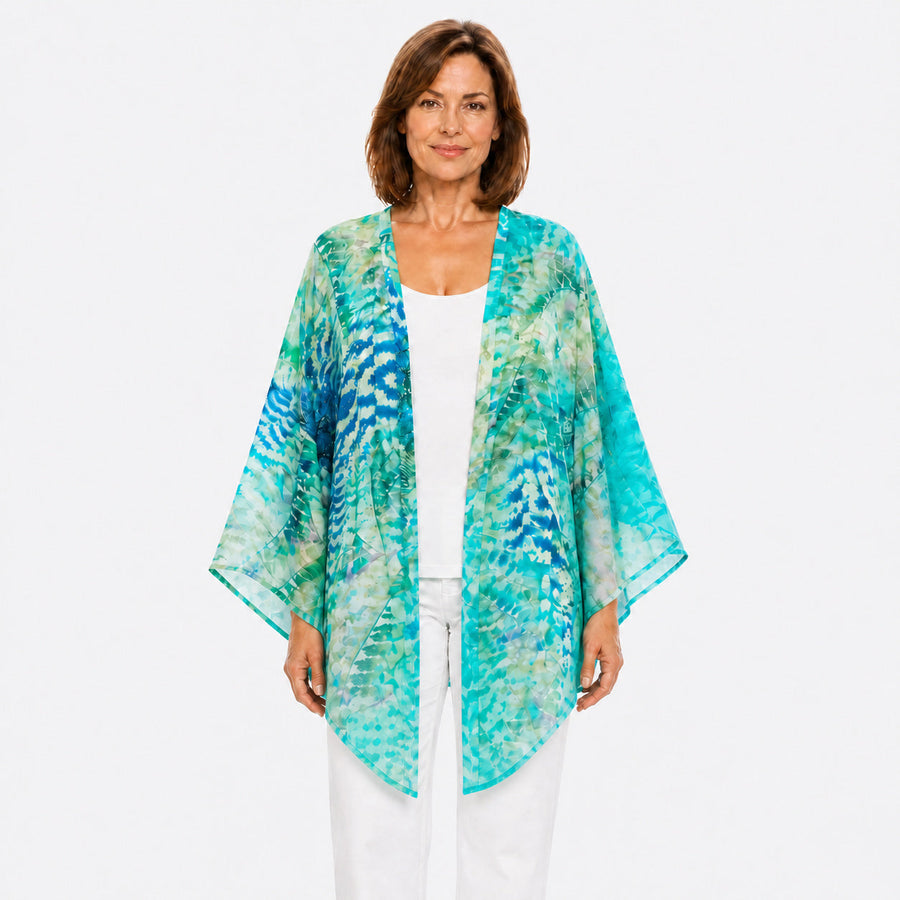Woman wearing the Claire Powell Marine Modal Kimono Cover-Up, front view