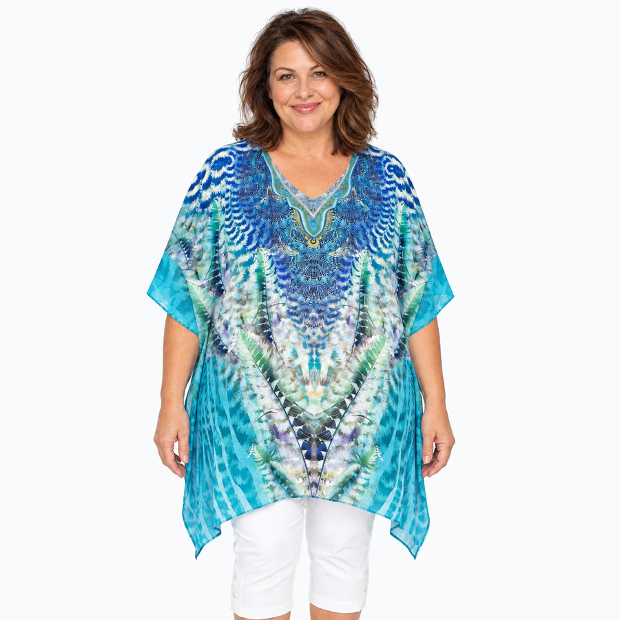 Woman wearing the Claire Powell Marine Plus Size Kaftan Top, front view
