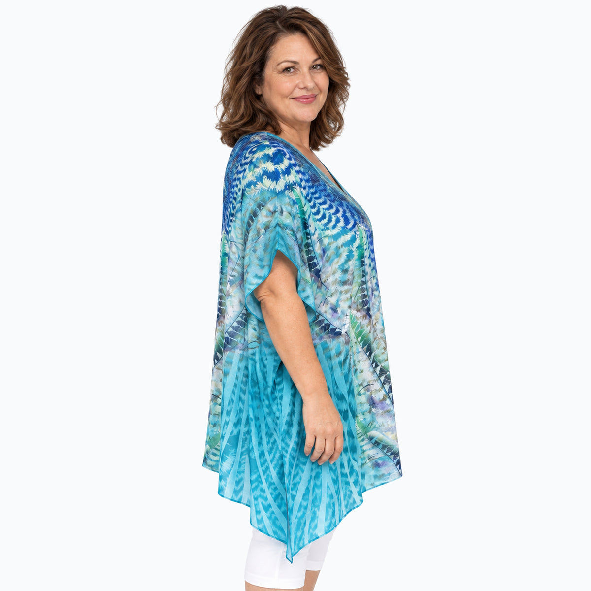 Woman wearing the Claire Powell Marine Plus Size Kaftan Top, side view
