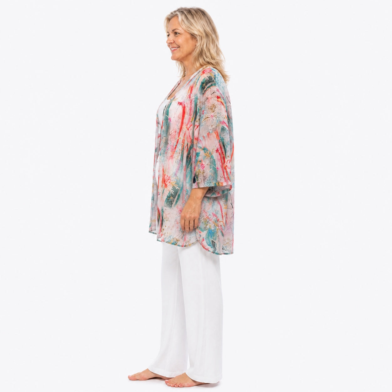 Woman wearing the Claire Powell Meadow Modal Kimono Cover-Up, side view
