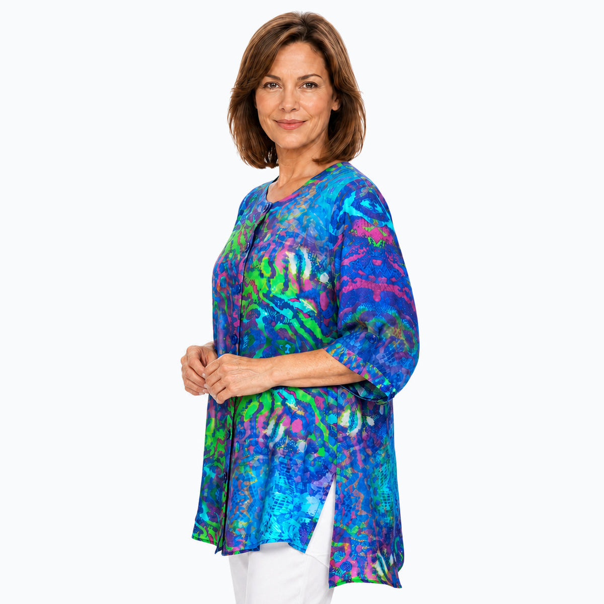 Woman wearing the Claire Powell Mirage A-Line Tunic Shirt, side view