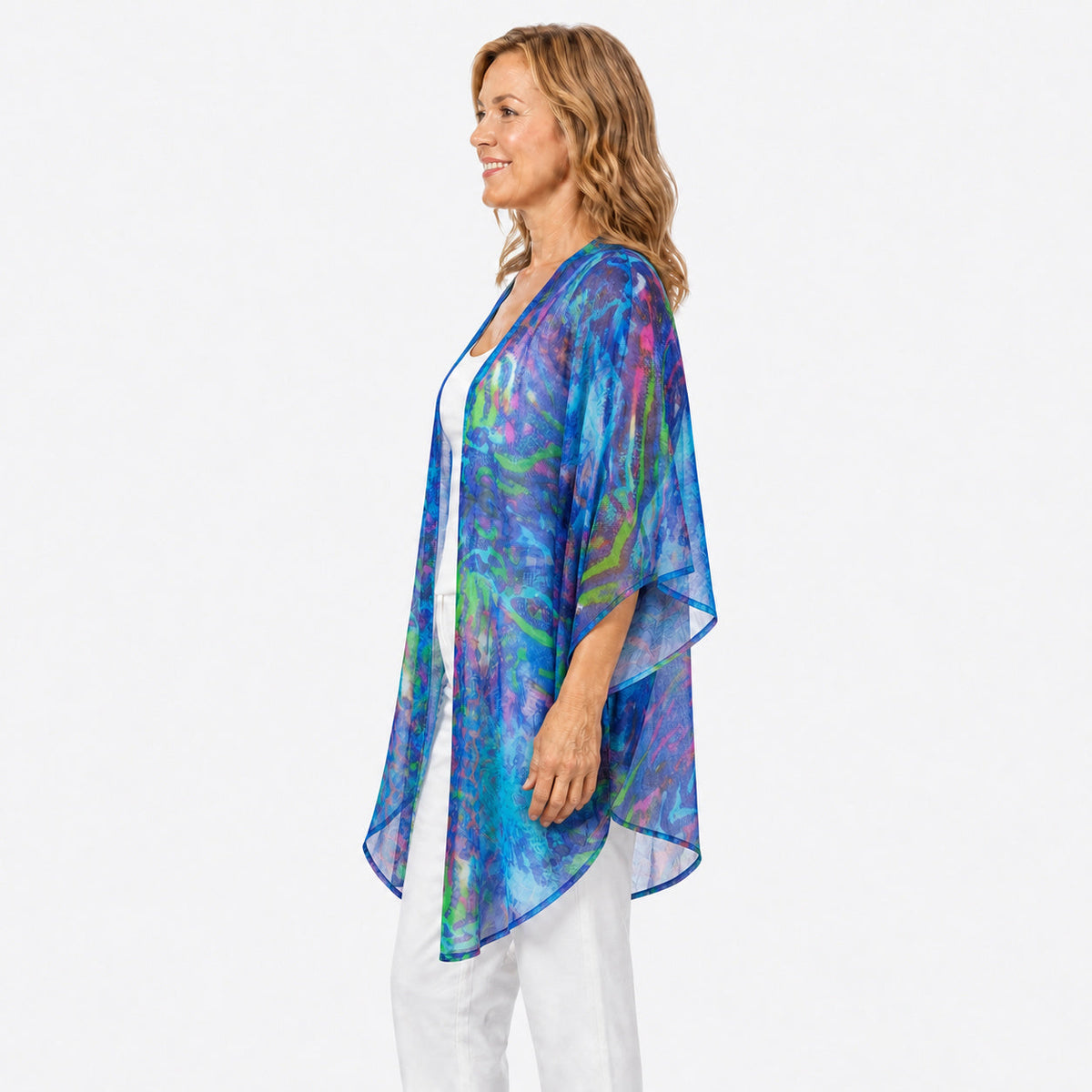 Woman wearing the Claire Powell Mirage Cotton Chiffon Kimono Cover-Up, side view