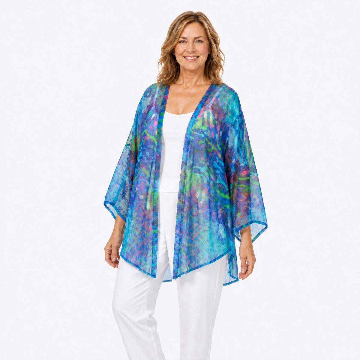 Woman wearing the Claire Powell Mirage Cotton Chiffon Kimono Cover-Up, three-quarter view