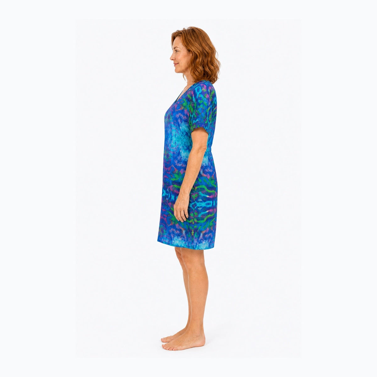 Woman wearing the Claire Powell Mirage Shift Dress, side view