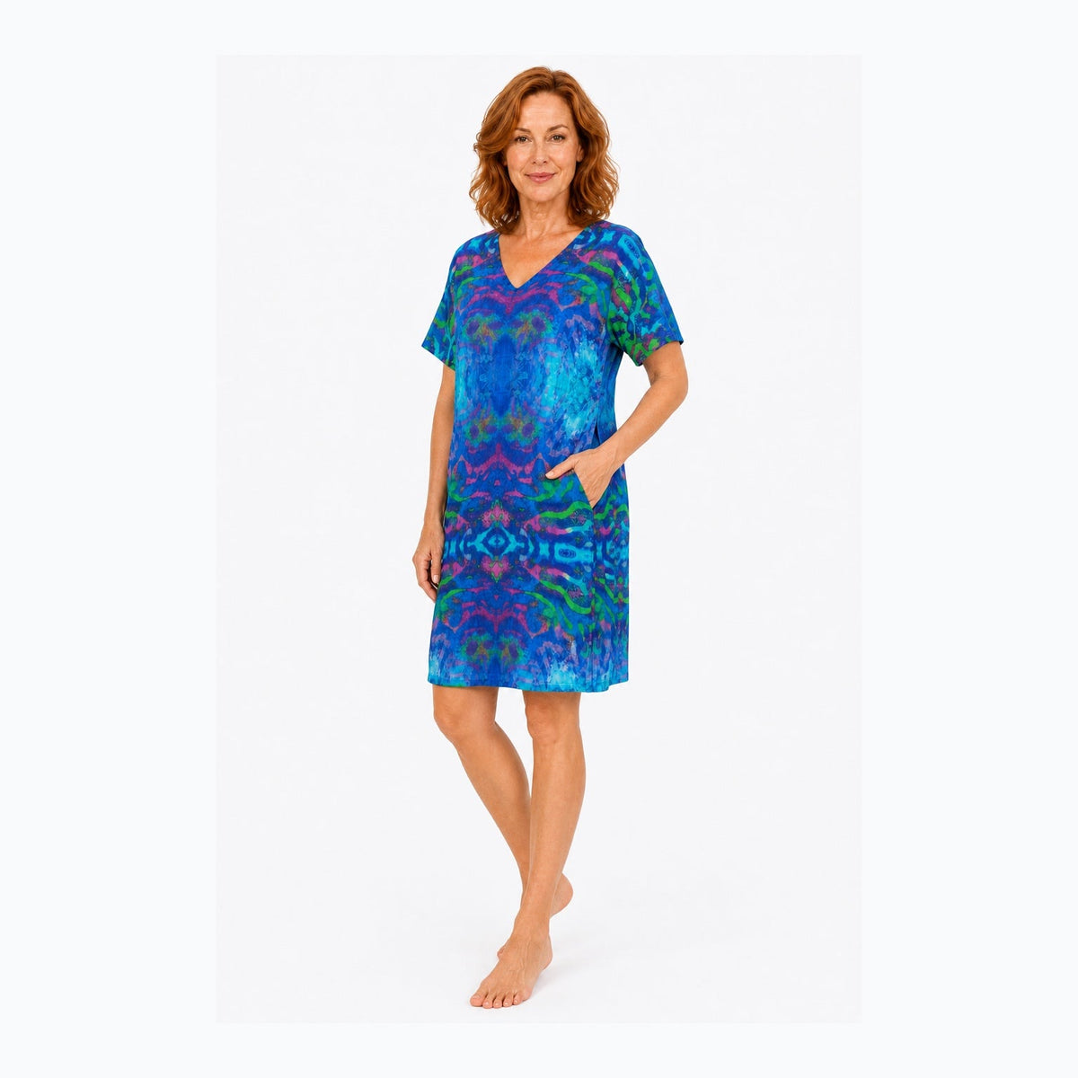 Woman wearing the Claire Powell Mirage Shift Dress, three-quarter view