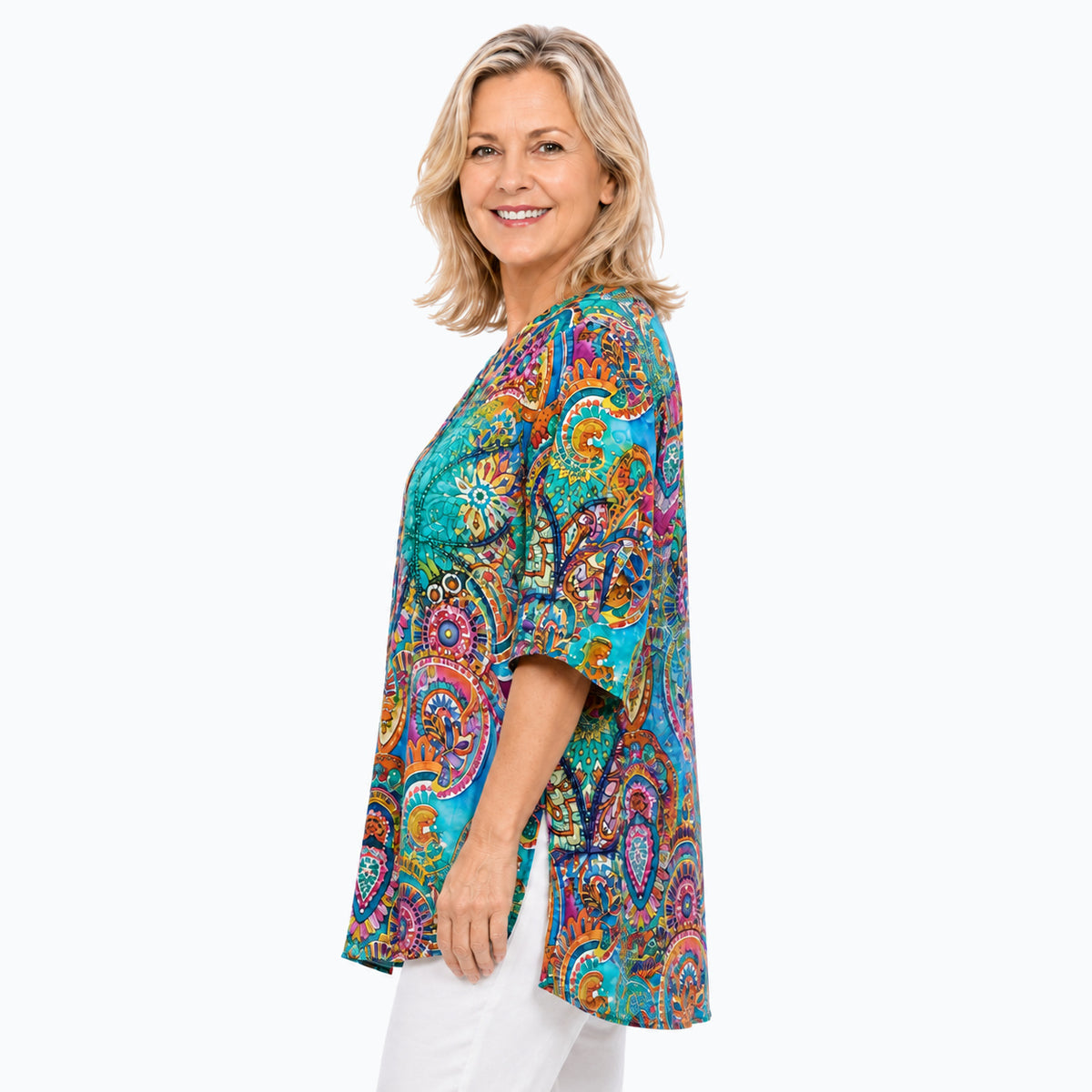 Woman wearing the Claire Powell Mosaic A-Line Tunic Shirt, true side view