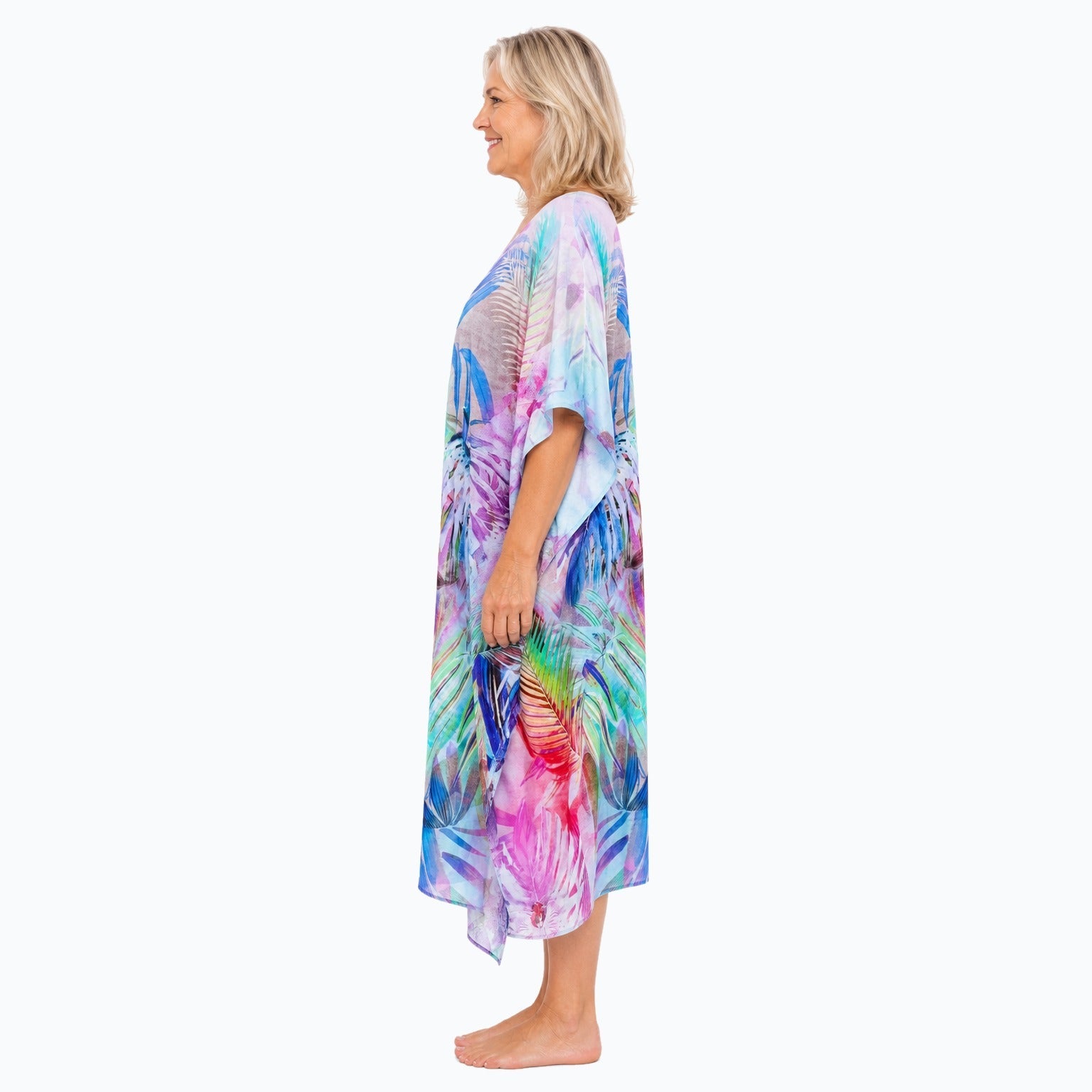 Claire Powell Oasis midi kaftan dress on a mature woman, side view
