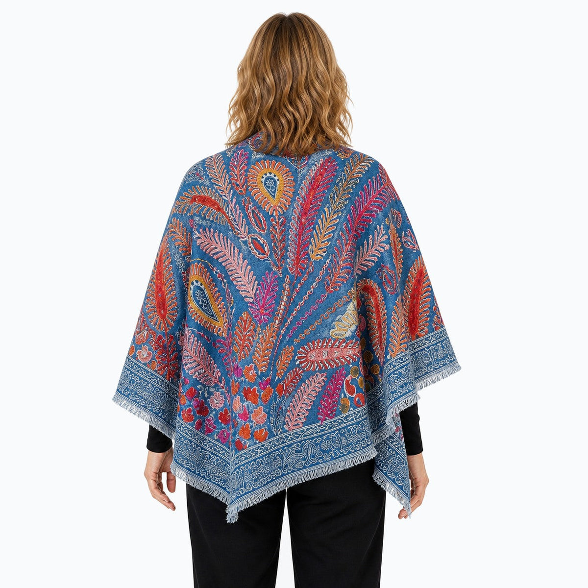 Woman wearing the Claire Powell Ocean Wool Shawl, back view