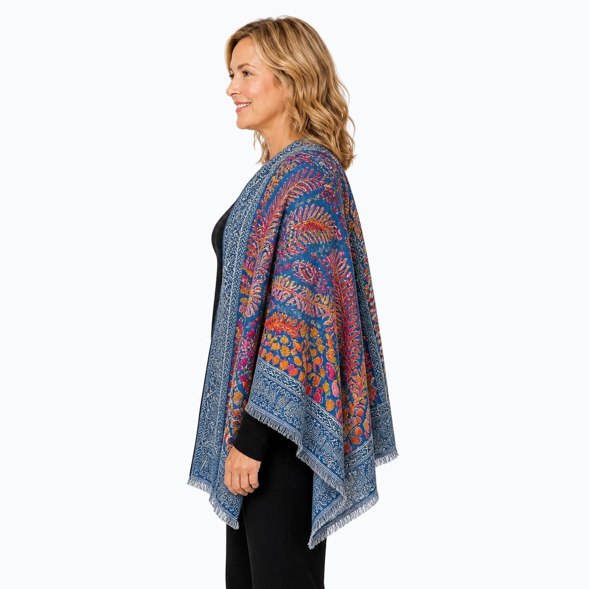 Woman wearing the Claire Powell Ocean Wool Shawl, side view
