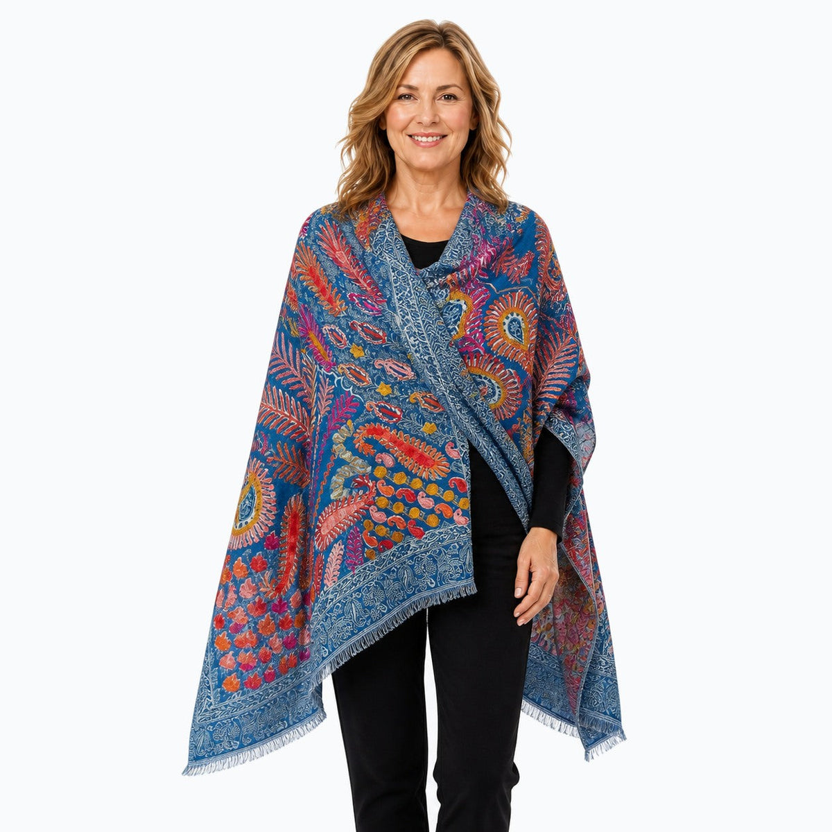 Woman wearing the Claire Powell Ocean Wool Shawl, three-quarter view