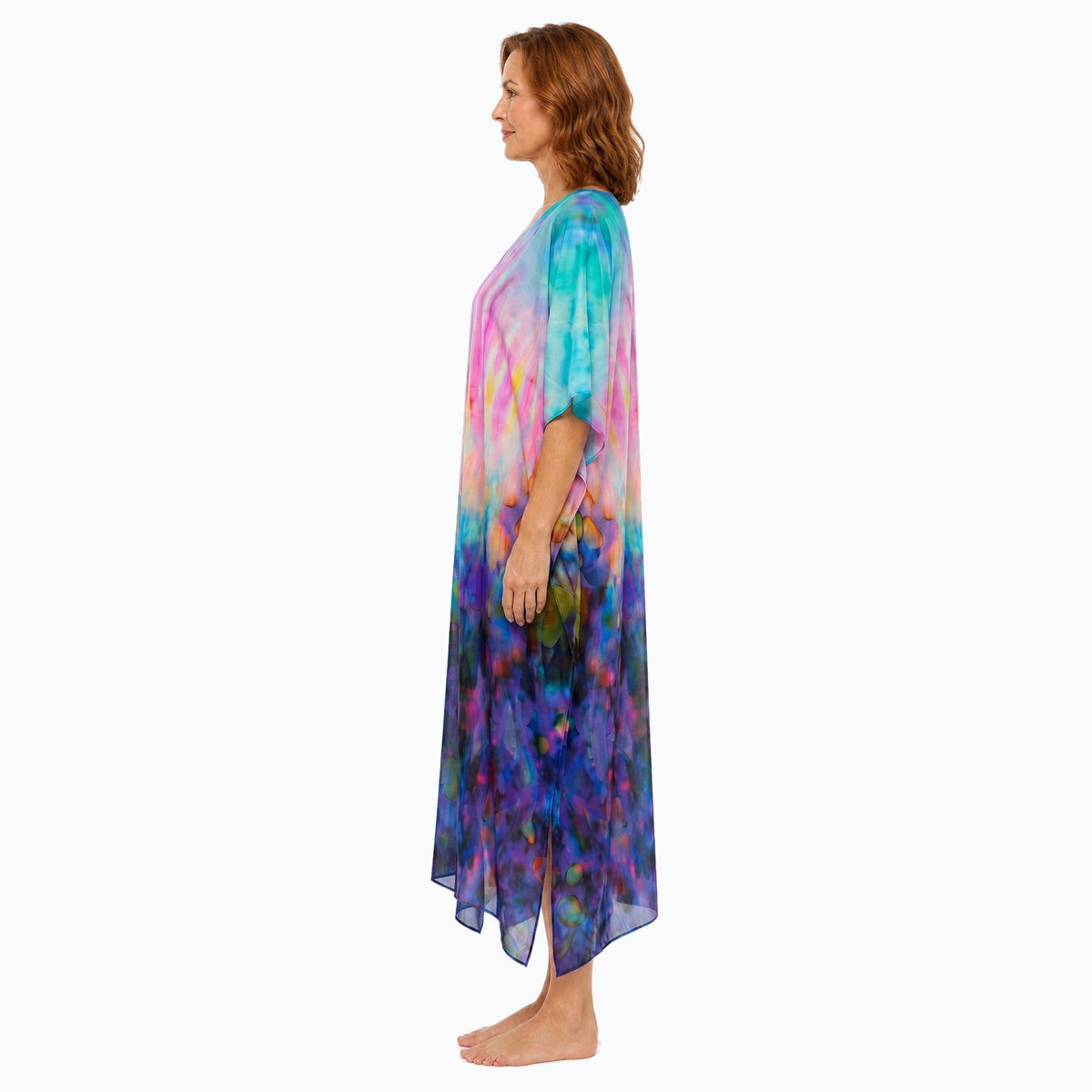 Claire Powell Opulence midi kaftan dress on a mature woman, side view