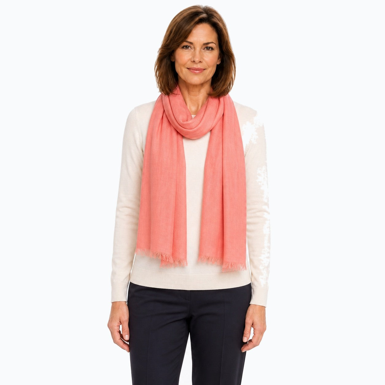 Woman wearing the Claire Powell Peach Silk Wool Scarf, front view