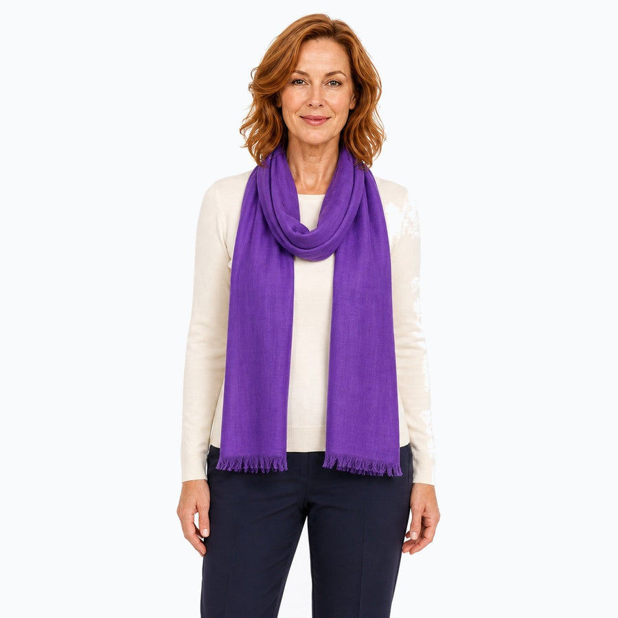 Woman wearing the Claire Powell Plum Silk Wool Scarf, front view