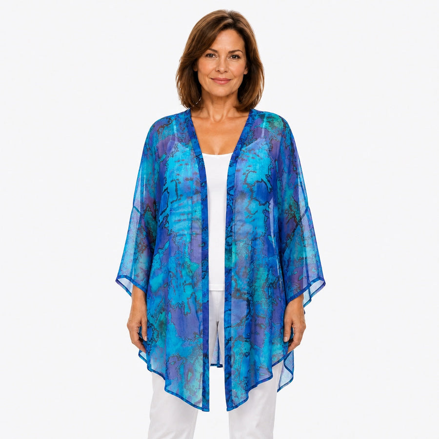Woman wearing the Claire Powell Reef Cotton Chiffon Kimono Cover-Up, front view
