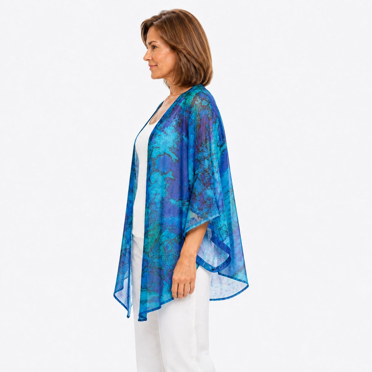 Woman wearing the Claire Powell Reef Cotton Chiffon Kimono Cover-Up, side view