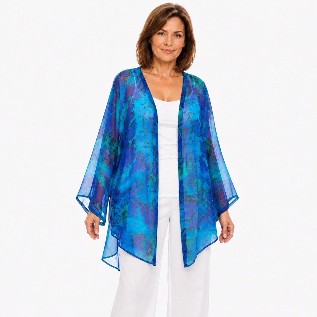 Woman wearing the Claire Powell Reef Cotton Chiffon Kimono Cover-Up, three-quarter view