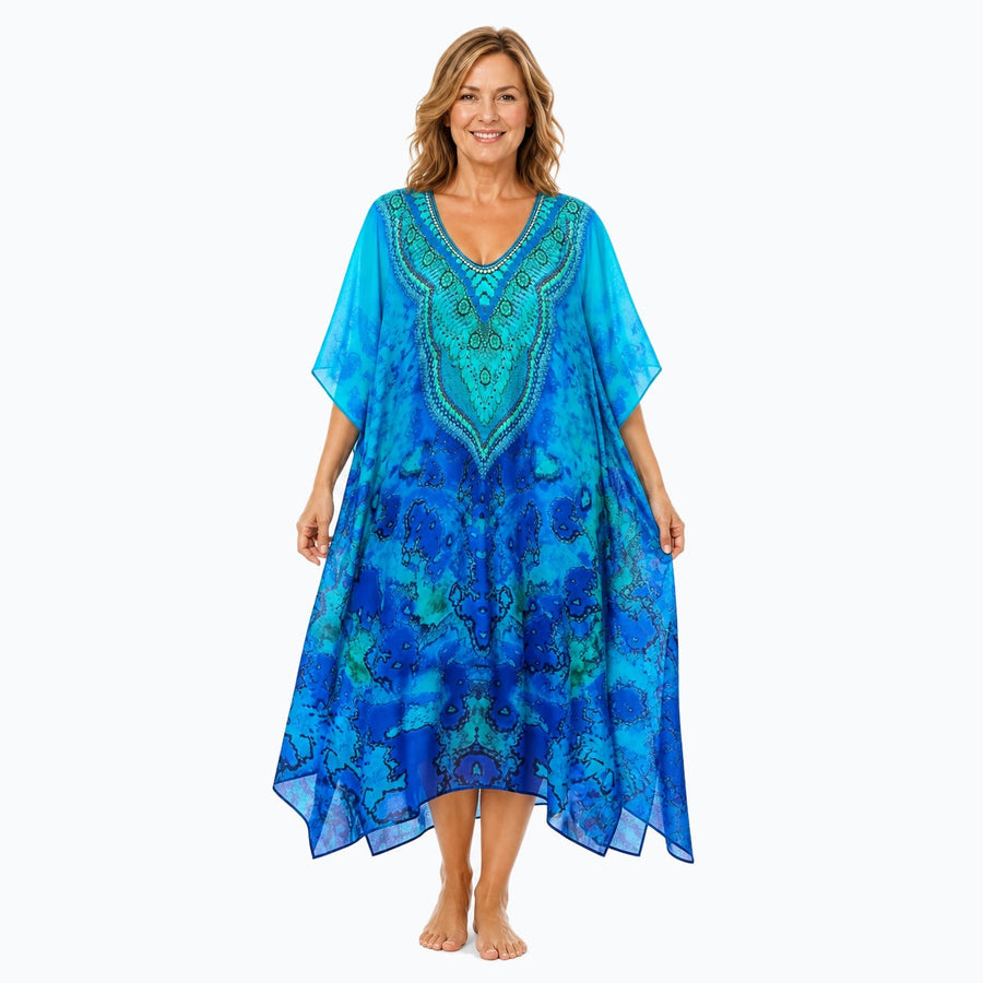 Claire Powell Reef midi kaftan dress on a mature woman, front view