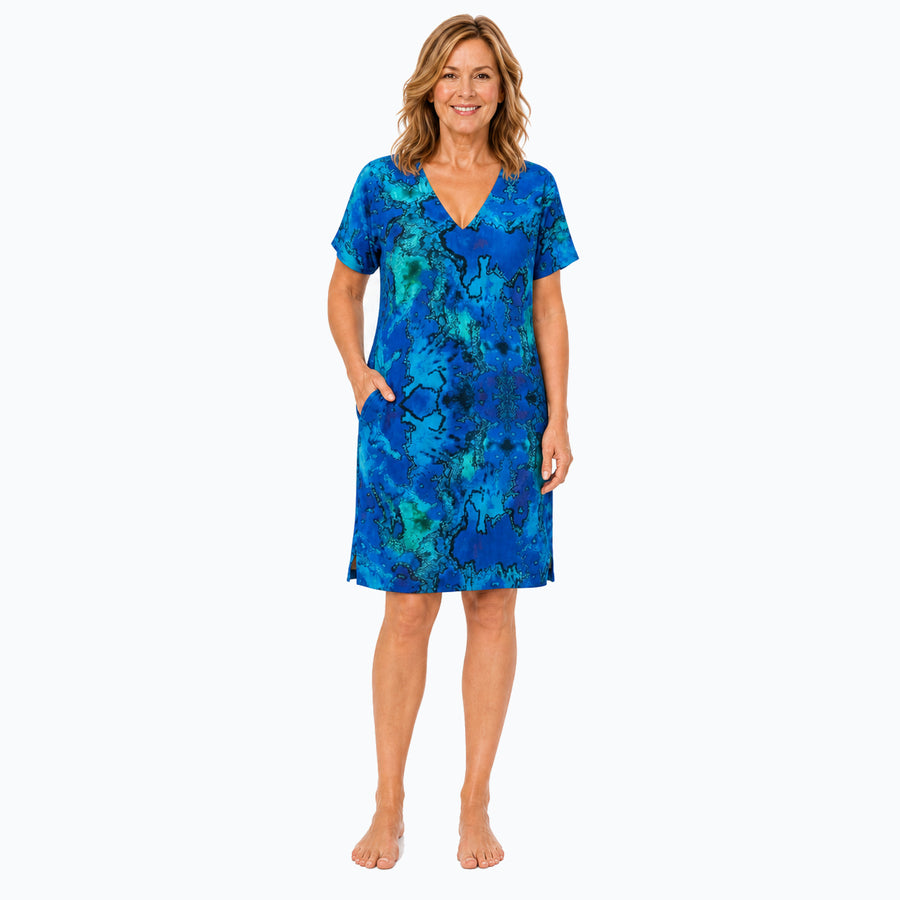 Woman wearing the Claire Powell Reef Shift Dress, front view