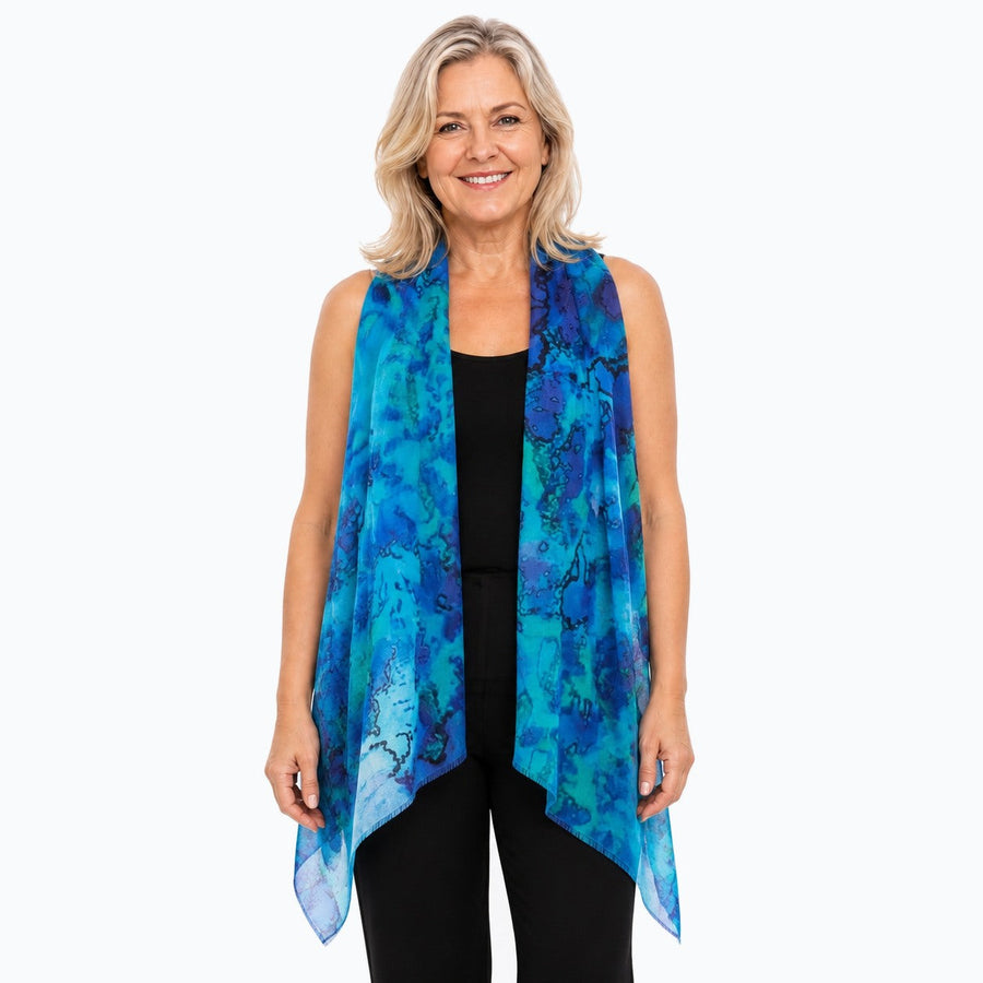 Woman wearing the Claire Powell Reef Silk Scarf, front view