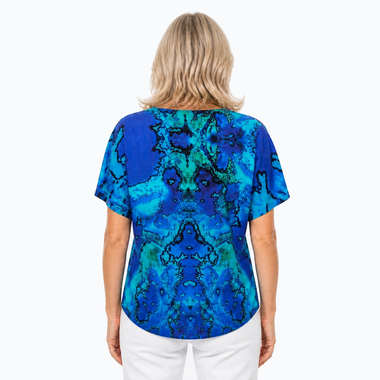 Woman wearing the Claire Powell Reef V-Neck T-Shirt, back view
