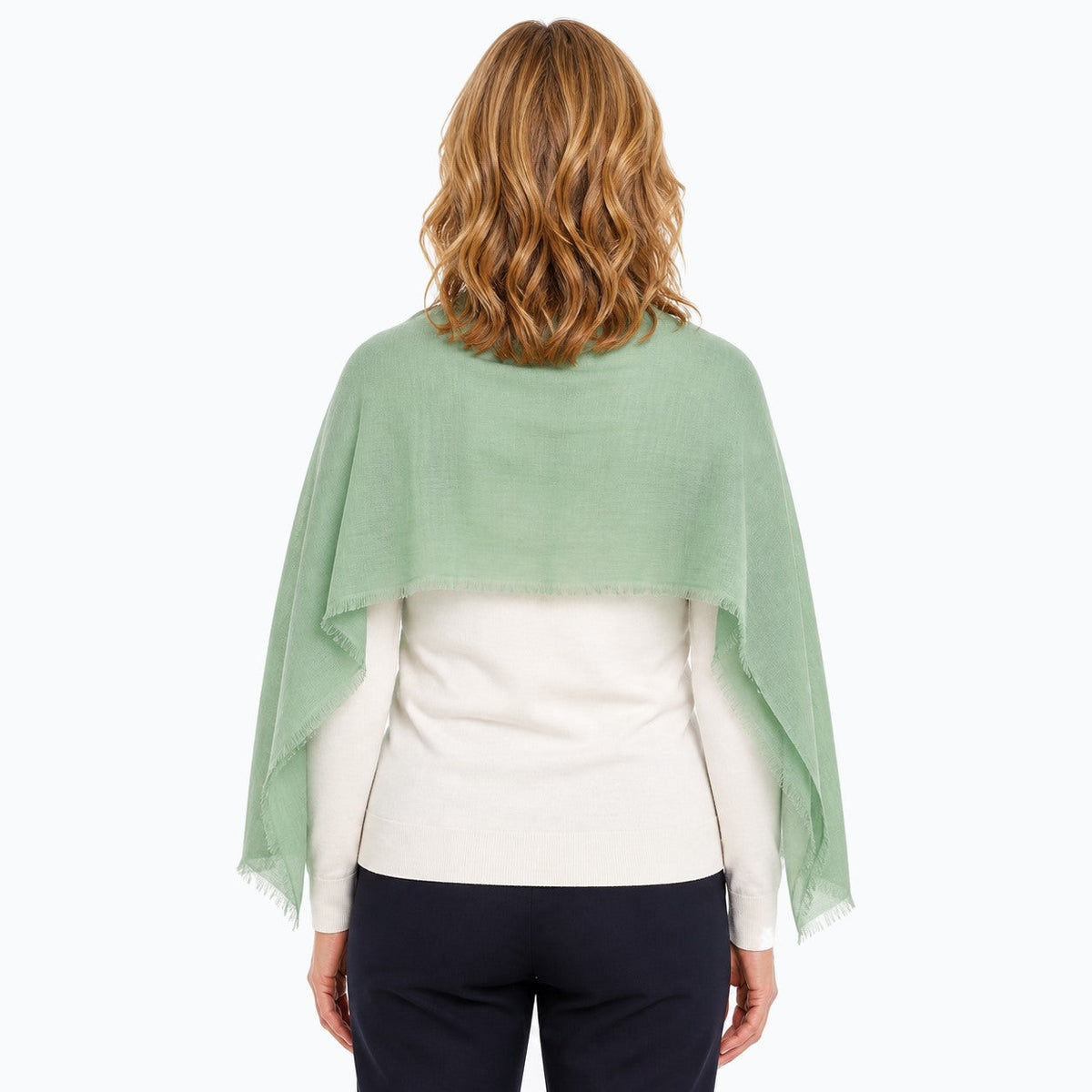 Woman wearing the Claire Powell Sage Silk Wool Scarf, back view