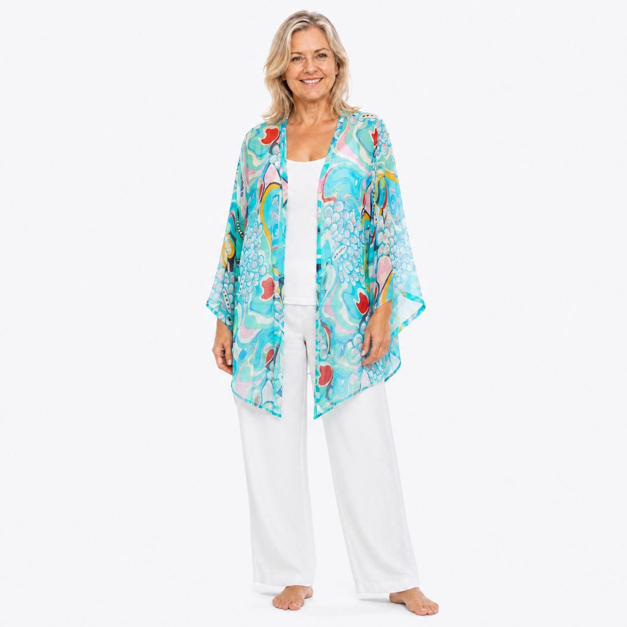 Woman wearing the Claire Powell Sakura Cotton Chiffon Kimono Cover-Up, three-quarter view