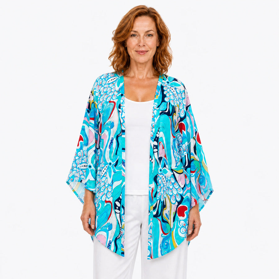 Woman wearing the Claire Powell Sakura Modal Kimono Cover-Up, front view