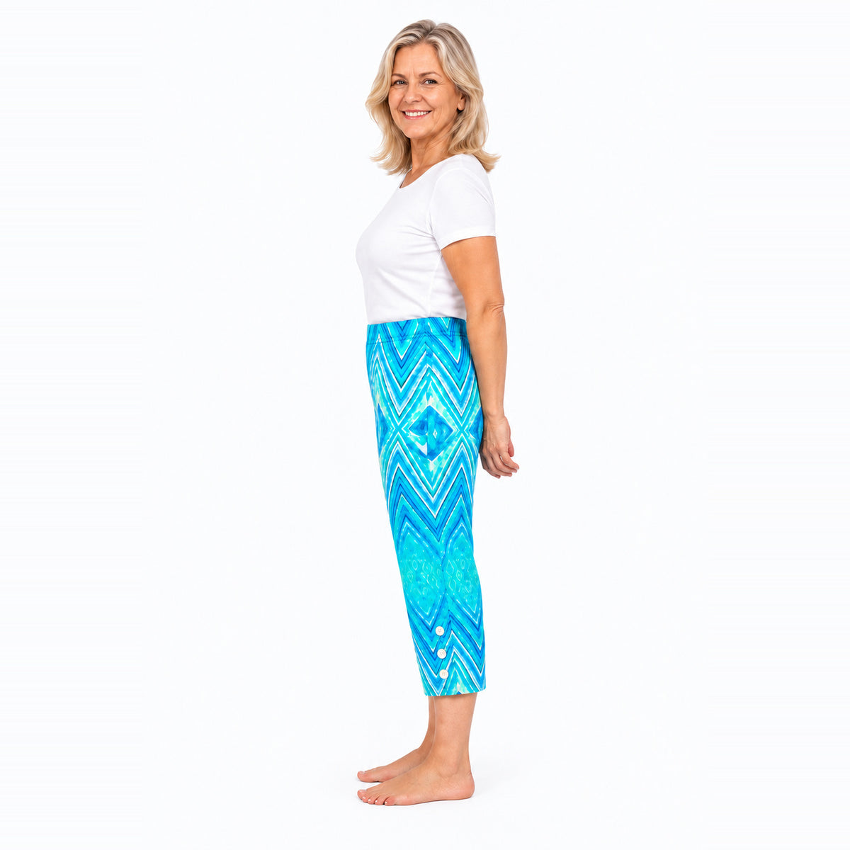 Woman wearing Claire Powell Serenity capri pants, side view