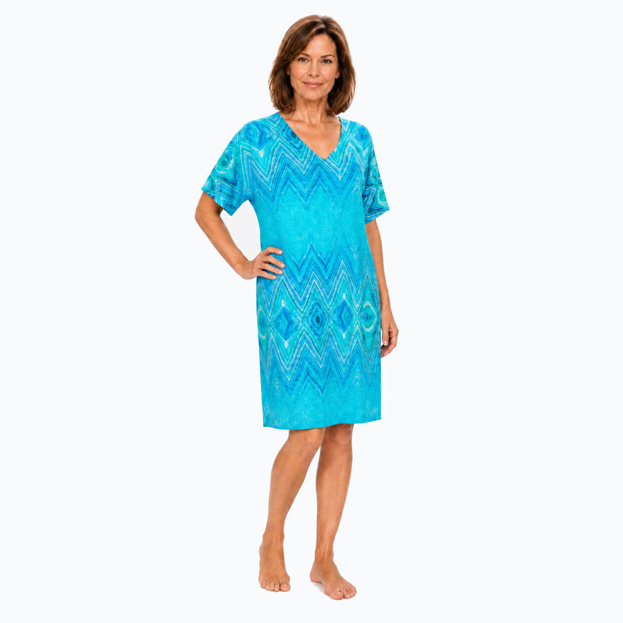Woman wearing the Claire Powell Serenity Shift Dress, front view