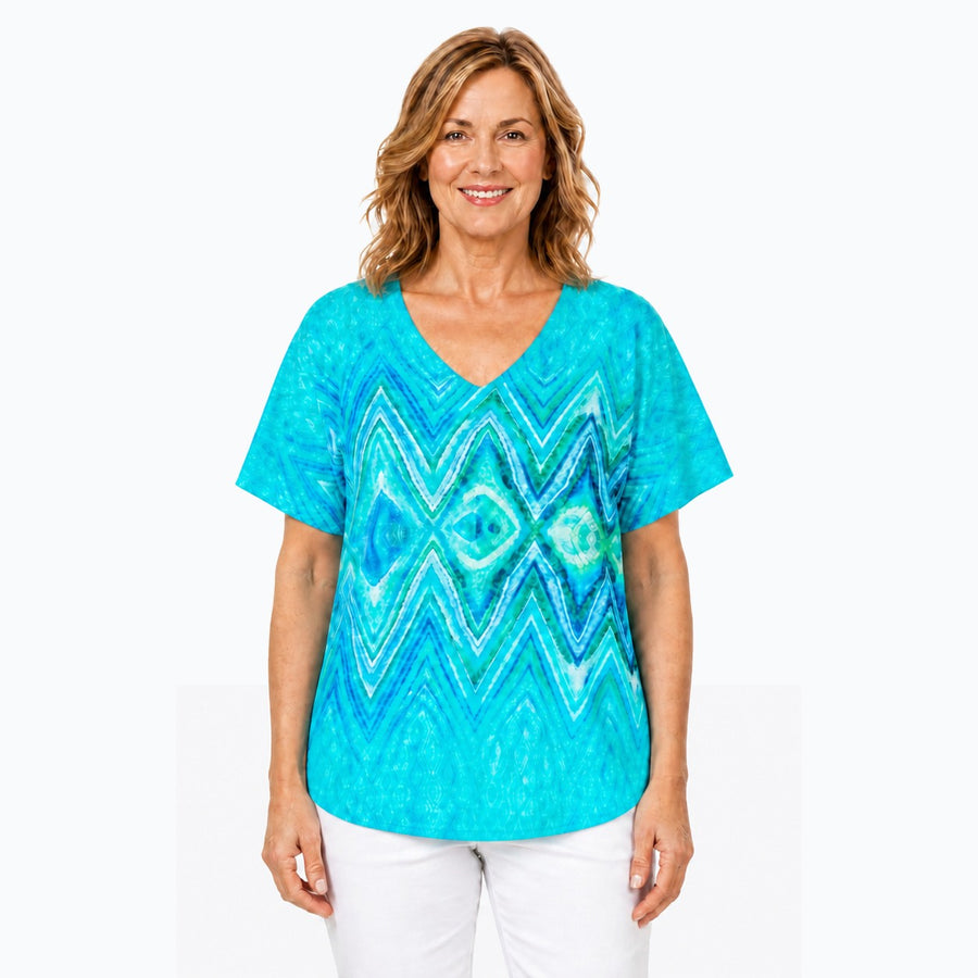Woman wearing the Claire Powell Serenity V-Neck T-Shirt, front view