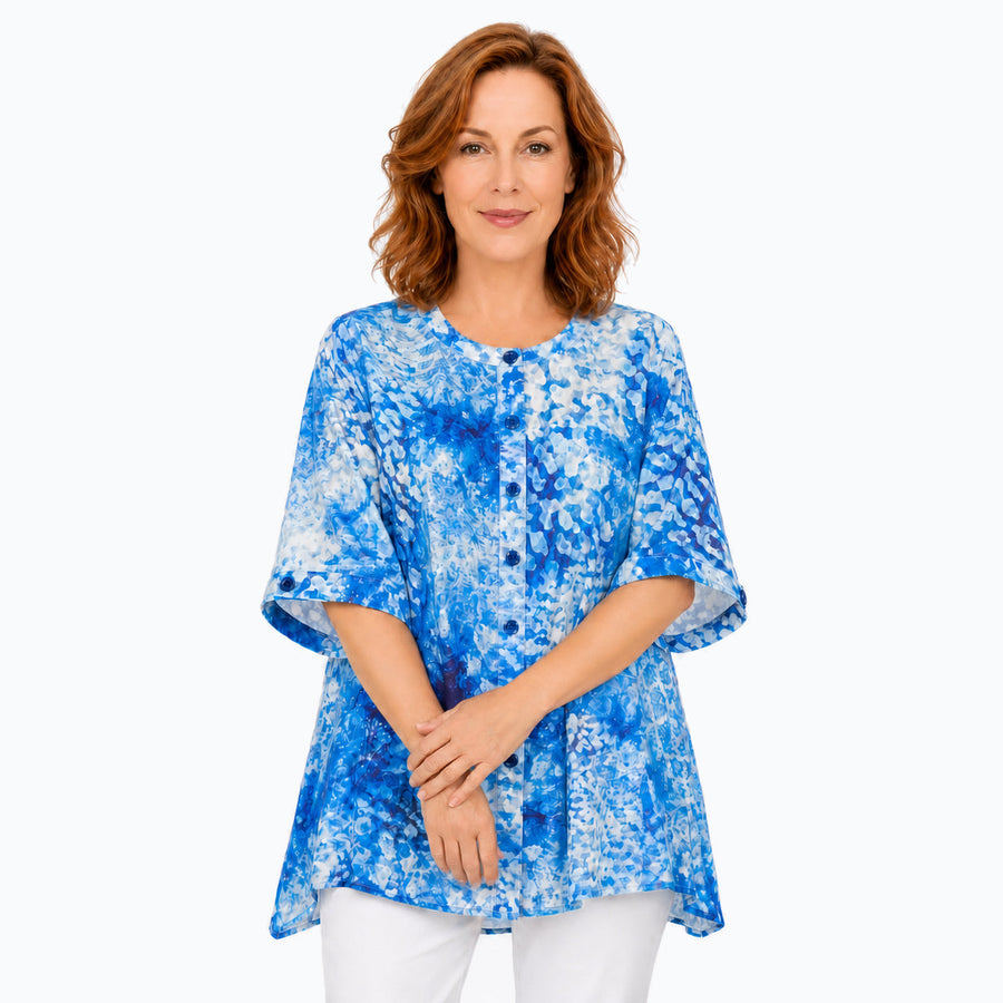 Woman wearing the Claire Powell Snowcat A-Line Tunic Shirt, front view